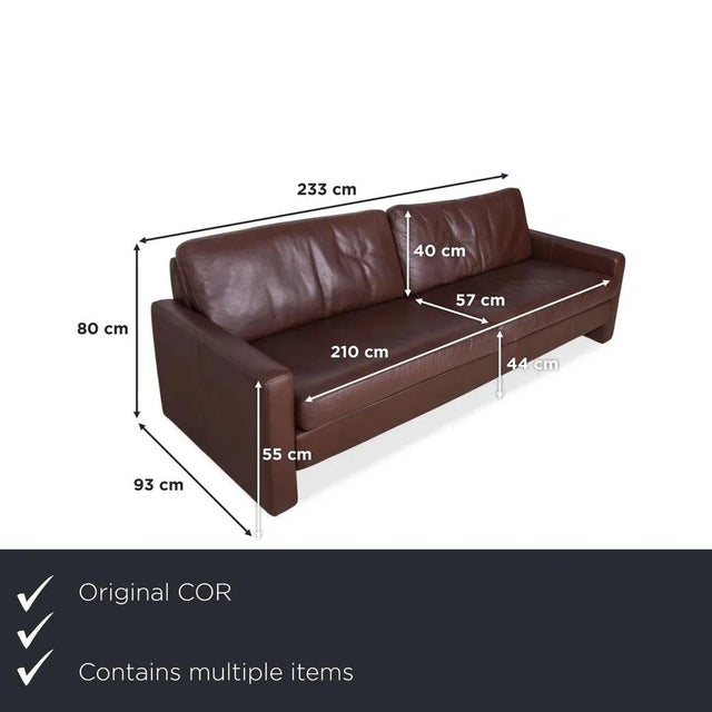 COR Conseta leather suite consisting of a three-seater sofa and armchair in brown. This model impresses with its timeless...