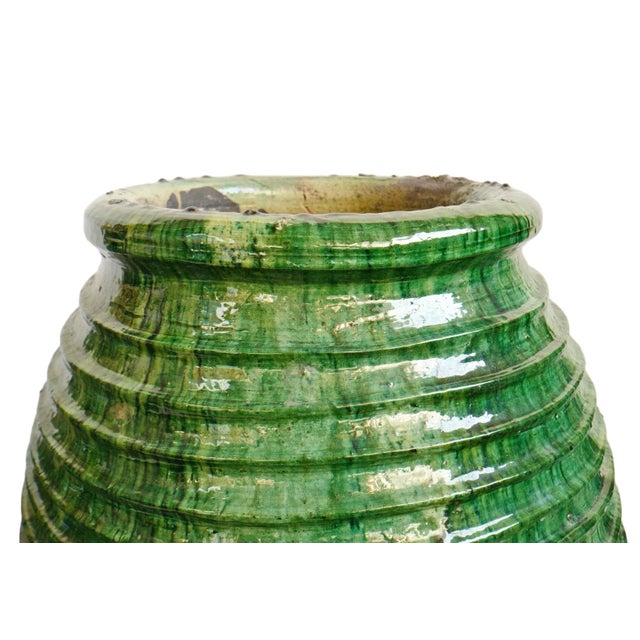 Striking green vintage Moroccan ceramic pottery with ribbed texture. Opening at top is 11" diameter. Includes drainage...