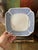 Pretty blue and white Asian bowl, presented in a mostly square shape with sides that gently slope and corners with just a...
