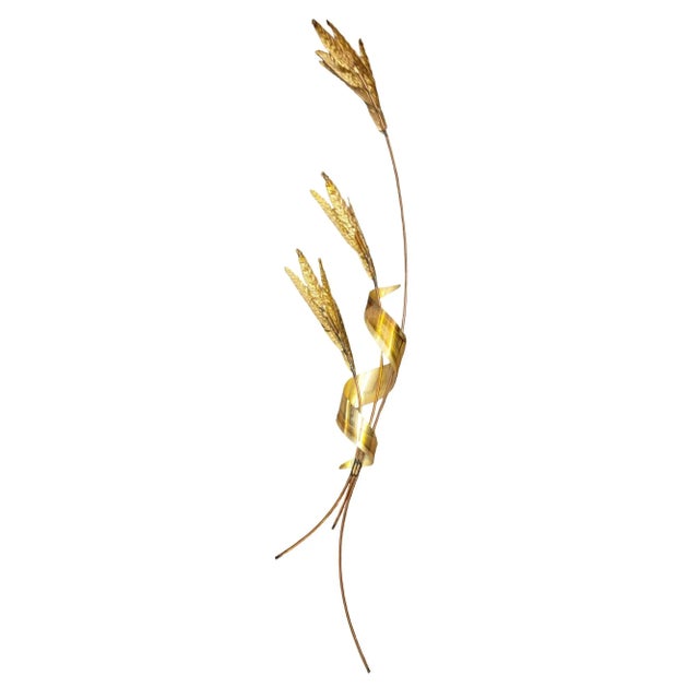 Great pair of painted metal wall mounted leaf decorations. Gold color pallet with a light weight deisgn make for easy...