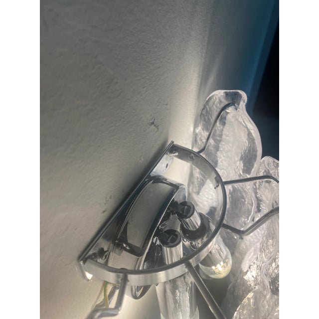 Transparent and White “fiamma” Murano Glass Wall Sconces Transparent and white vintage “FIAMMA” wall sconce. “Flames” are...