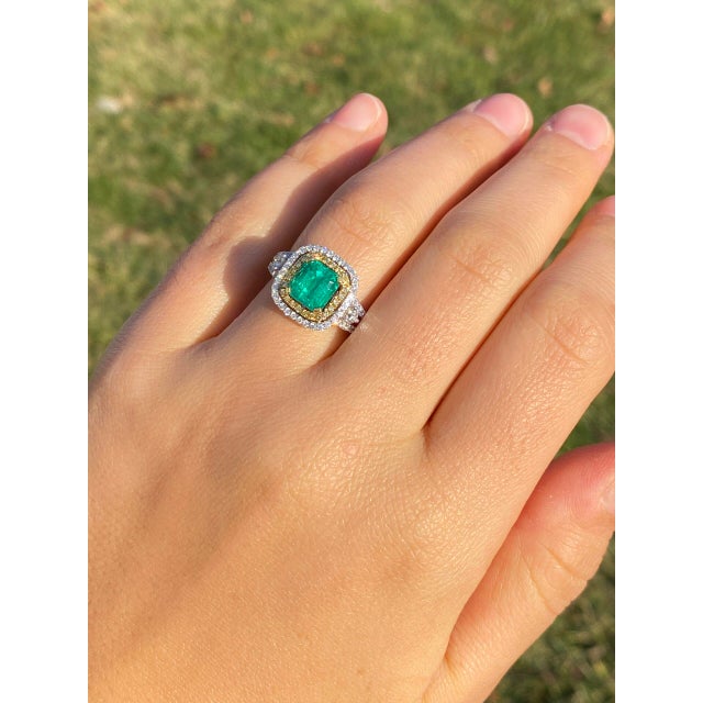 The 73rd Avenue: Square Emerald Cut Emerald and Natural Diamond Double Halo Ring. This exquisite ring features a...