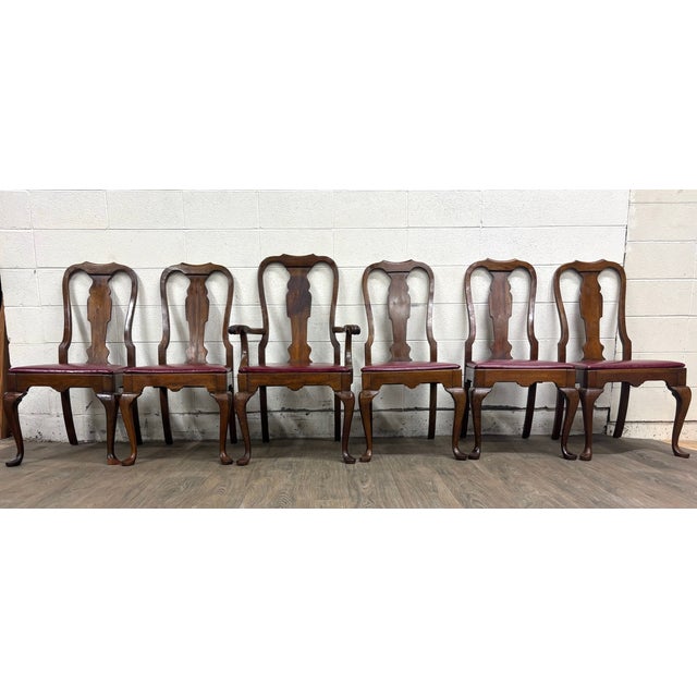 This is a gorgeous set of six vintage Pennsylvania House solid cherry dining chairs, including five side chairs and one...