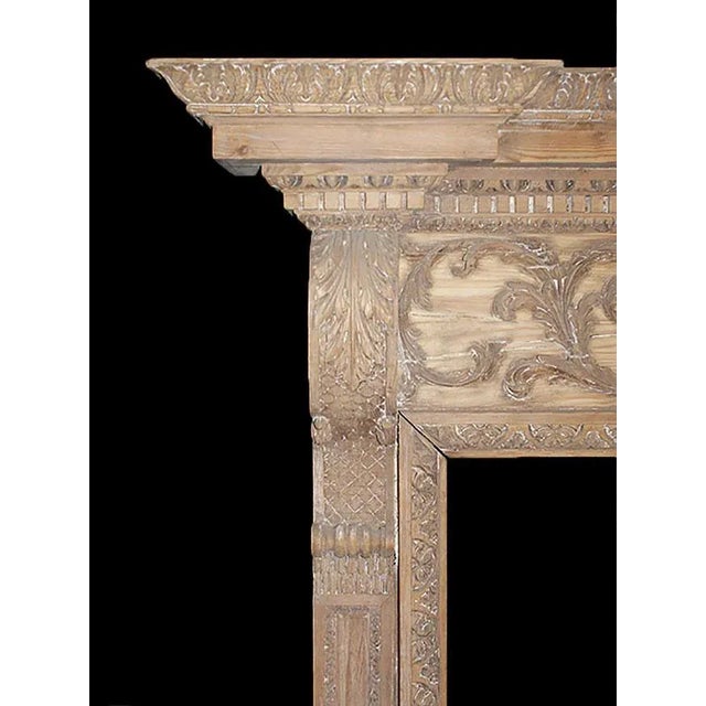 Early Georgian style, beautifully carved wood mantel. Paneled jambs with scrolled acanthus corbels and frieze with rinceau...