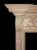 Early Georgian style, beautifully carved wood mantel. Paneled jambs with scrolled acanthus corbels and frieze with rinceau...