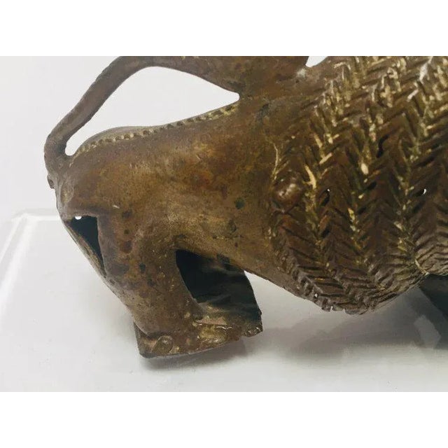 Vintage African Cast-Bronze Sculpture of a Stylized Mythical Lion For Sale - Image 11 of 13