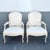 This elegant pair of French Provincial lounge chairs embodies timeless Louis XV-inspired design with graceful curves,...