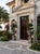 A Pair of Grand Neoclassical Cast Stone Urns on Paneled Pedestals For Sale - Image 10 of 12