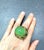 Natural Green Penite - 12 Carat Chrome Dioxide - 3 Carat Peridot - 2 Carat This Ring is from the "Orient" traveling...