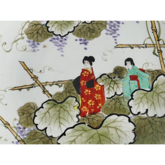 Ceramic Meiji Hand-Painted Kutani Porcelain Charger with Women and Vine Arbor, 1920s For Sale - Image 7 of 18