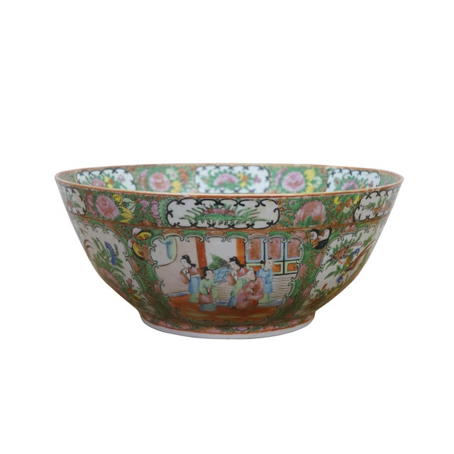 Five piece antique 19th century Chinese Export Famille Rose serving bowl and platters. Featuring various garden and...