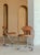 The chair features a gracefully curved tubular steel frame that creates a floating look. The organically shaped backrest,...
