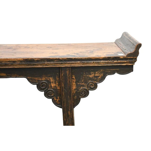 This Antique Asian Wood Long Alter Console Table hails from China and dates back to the early 19th century. Made from...