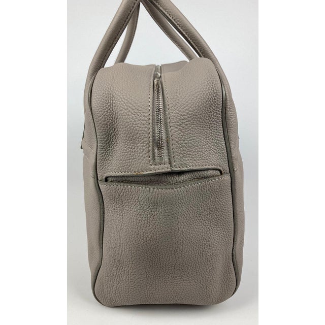 Loro Piana Grey Leather Duffle Tote in excellent condition. Grey leather lambskin exterior trimmed with top double...