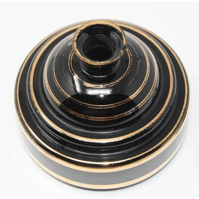 French Art Deco crystal gilt glass perfume bottle. Hand blown black glass perfume bottle gilded with 24-karat gold hand...