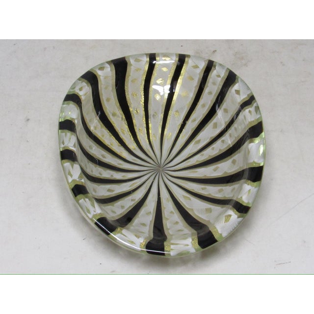 Mid-century Italian Murano art glass dish, c.1960’s Made in the latticino technique where contrasting colored rods are...