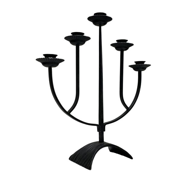 A striking vintage West German five-light candelabra crafted from black-finished metal. The sculptural design features a...