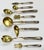 Antique French hors d'oeuvres set of eight (8) pieces featuring handles in Repoussé sterling silver in a classical design....