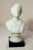 This antique Charles Sumner figural glass bust statue is a lovely statue made of a frosted white glass mounted to a black...