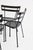 A well-composed set of four iron side chairs in the modernist garden furniture tradition, each constructed entirely in...