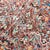 This is a hand-knotted Turkish Sparta (Isparta) rug from the 1960s in a Persian Kerman-style all-over floral design....