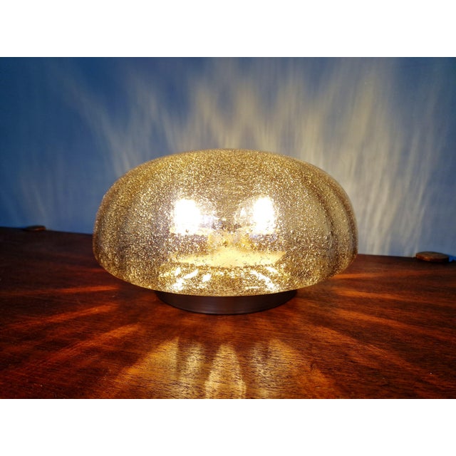 Smoked bubble glass ceiling light with a gold-tone metal base, Space Age design, 1970s. Compatible with two E27 LED bulbs....
