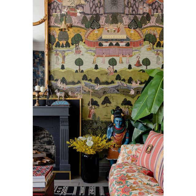 The sound of music echoes around the valley as lovers embrace and crowds dance together in unison, amongst gardens...