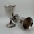 Eight matching silverplate goblets with all the polish of a well-dressed midcentury dinner party. Made by F.B. Rogers...