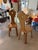 This pair of mid-century French chalet side chairs was manufactured circa 1960. Being sold as a set of two (x2). They...