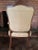 Antique French Louis XV–style bergère chair from the late 19th century, featuring a beautifully carved walnut frame with...