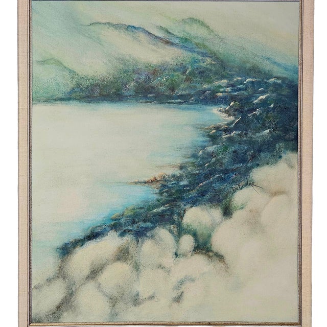 Mist settles like a hush over the craggy shoreline, brushing past green slopes and pale foam in a tender haze. Du Bridge,...