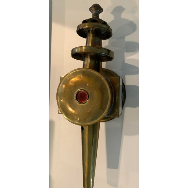 The brass lantern was used at the side of horse-drawn carriages and later as additional lighting on the first autos in the...