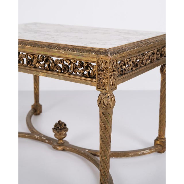 Antique louis xvi salon table from the 1850s with marble top, gilded wood and detailed carvings. Louis xvi furniture style...