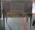 Antique, early 20th century, mirrored writing desk. This substantial desk has four tapered and turned legs and paneled...