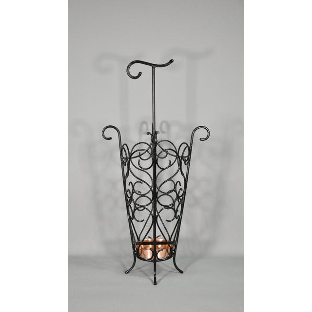 French Umbrella Stand in Wrought Iron 1950s A stylish and attractive French Umbrella Stand dating from the 1950s. It has...