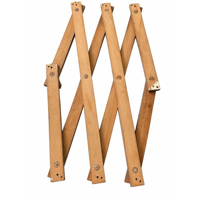 Vintage mid-century modern expandable wooden wall-mounted coat and hat rack, Made in Yugoslavia, circa 1960s–1970s. Info...