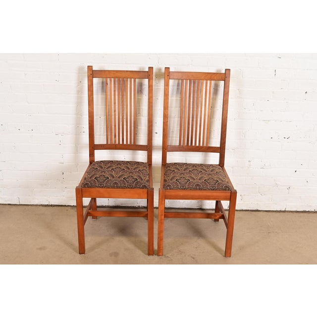 An exceptional pair of Mission or Arts & Crafts style spindle back side chairs or dining chairs By L. & J.G. Stickley USA,...
