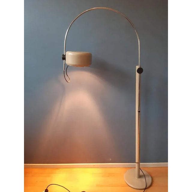 One of a kind floor lamp by Kaiser Leuchten. The arc can be adjusted in height and in position. The shade itself can also...