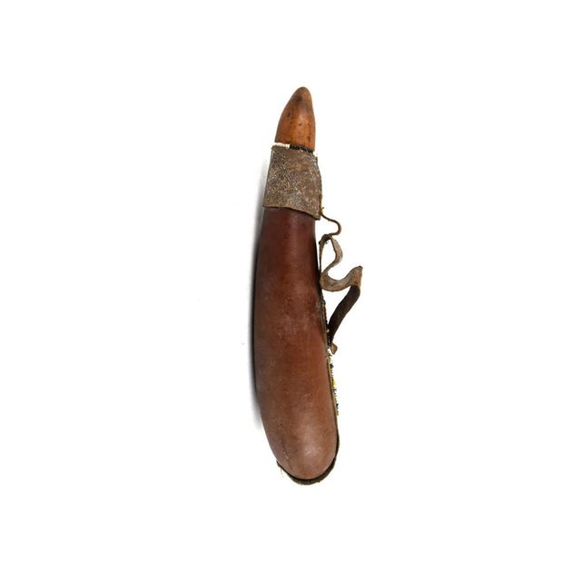 The Maasai milk gourd, a significant symbol in Maasai culture, epitomizes sustenance, community, and heritage within this...