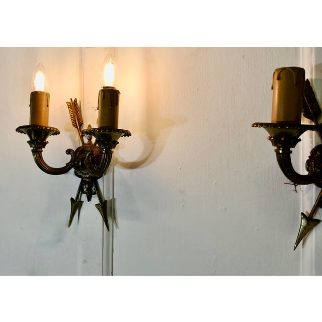 An Unusual Pair of French Brass Twin Wall Lights, with Arrows This is a very attractive pair of lights they each have 2...