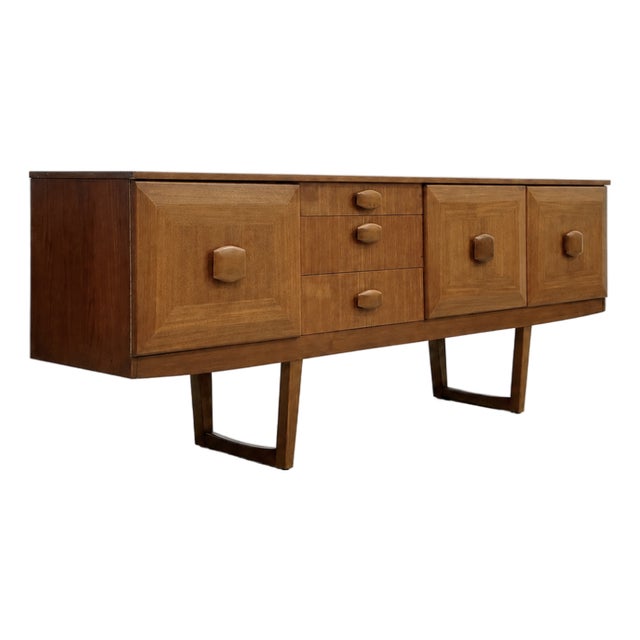 Mid Century Modern Teak Credenza by Stonehill | Long Sideboard With Funky Sculpted Pulls and Sled Legs, Made in England, C. 1960’s For Sale