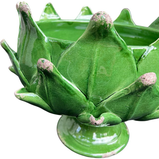 This emerald green artichoke pedestal bowl was hand-thrown and painted in Tuscany, Italy by a heritage studio known for...
