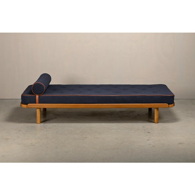 Scandinavian Modern Daybed by an unknown Danisch manufacturer 1960s. The solid oak frame is in good conditions with light...
