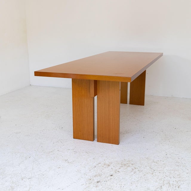 Rectangular cherry wood table, Italian design and product from the 1960s/1970s. The frame is made of wood with a honey-...