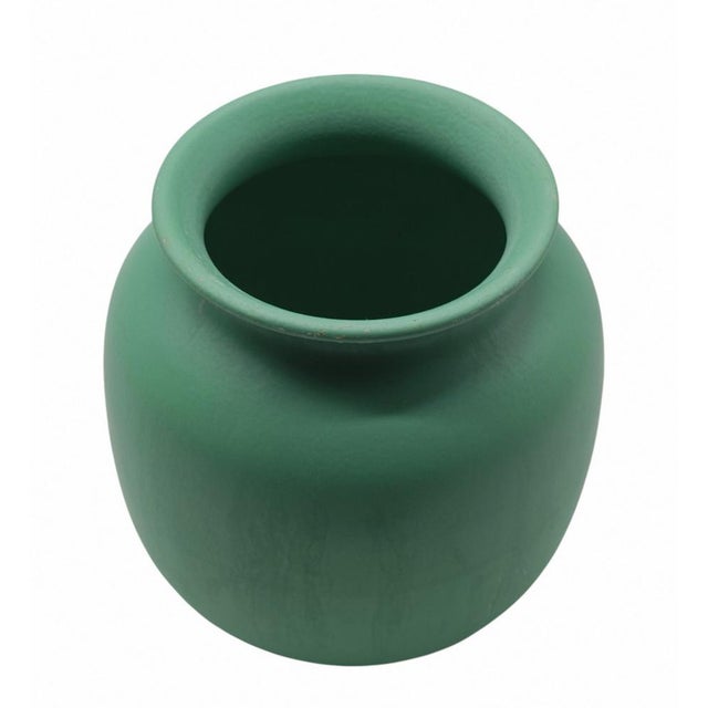 Handcrafted green ceramic vase, designed in the style of Giovanni Gariboldi for Richard Ginori. Characterised by soft...