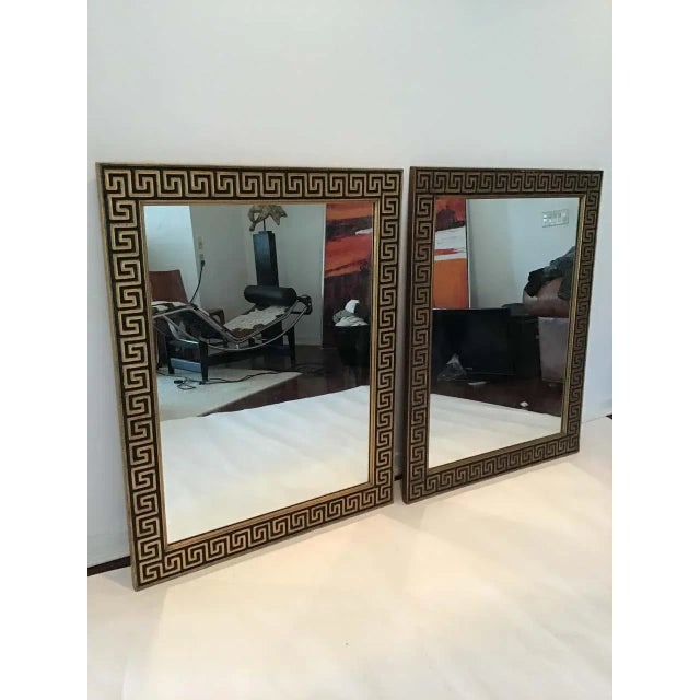 Pair of gilt-wood framed Greek key mirrors.