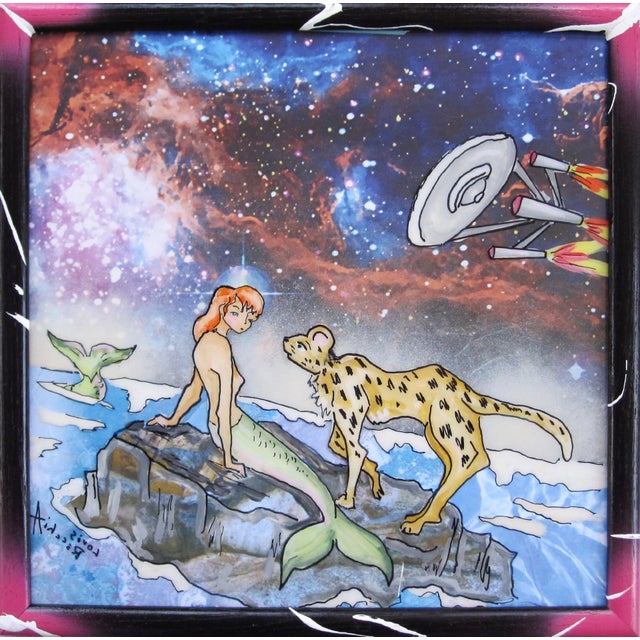 The artwork features a whimsical scene on a rocky outcrop, where a mermaid interacts with a cheetah against a vibrant...