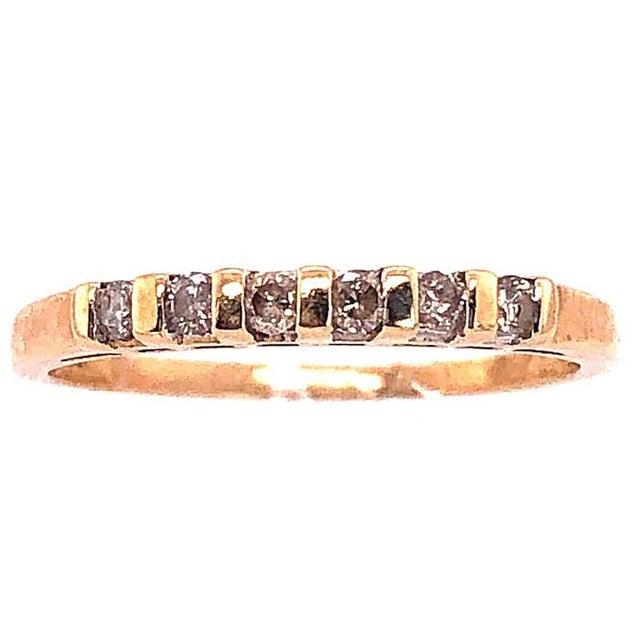 14 Karat Yellow Gold Diamond Band Bridal Wedding Anniversary Ring Size 7.75. 0.30 total diamond weight. 2 grams total weight.