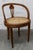 Elegant vintage chair (1900s–1930s) in carved wood, with a lovely lyre-shaped back and caned seat (hand-woven caning) in...