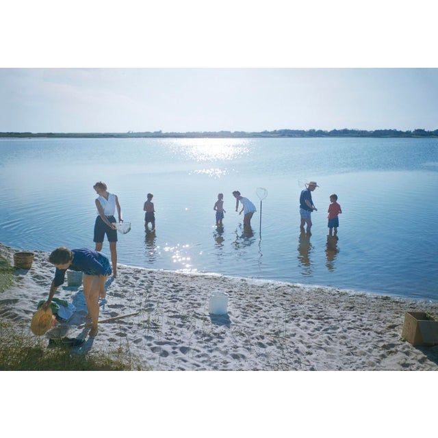 Crabbing In The Hamptons by Toni Frissell Family and friends are crabbing on a beach in Long Island, Hew Hamptons August...